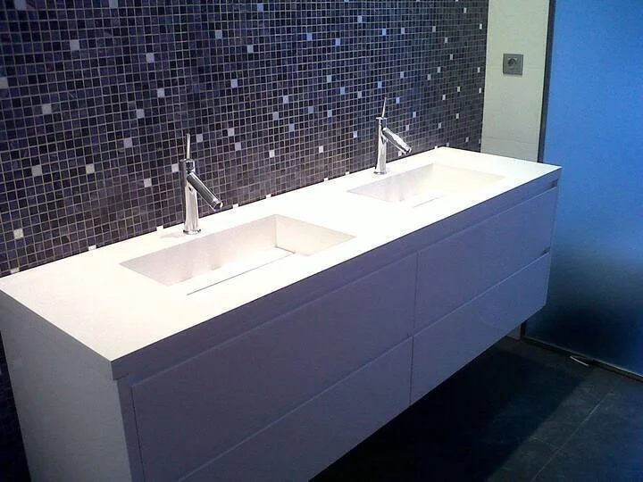 Corian solid surface vanity with integrated basins